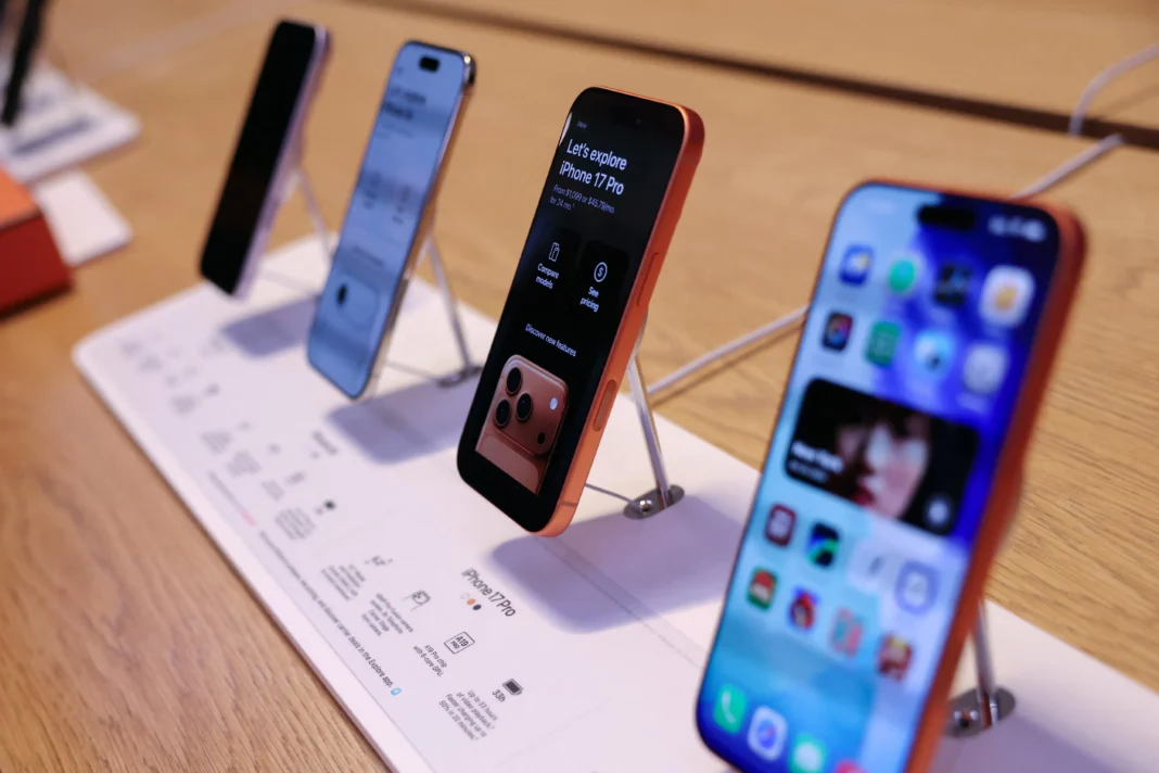The iPhone 17 series stands on display at the Apple Store in New York City, U.S., September 19, 2025. REUTERS/Shannon Stapleton
