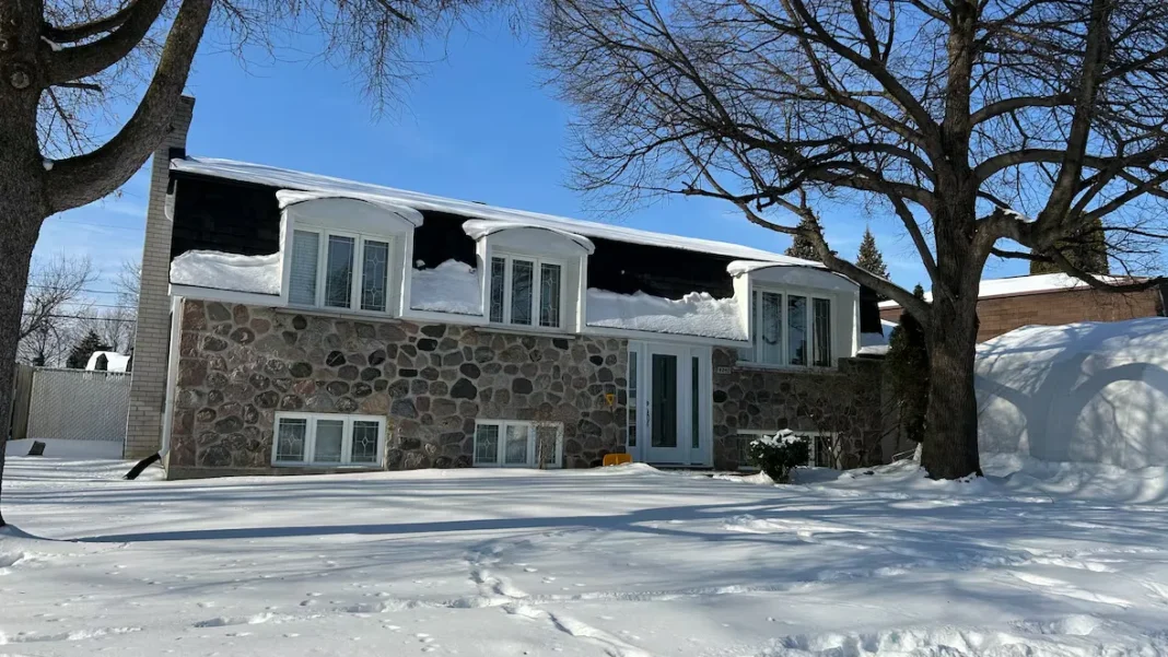 Two people, a husband and wife, were found dead inside this Brossard, Que., home early Monday morning. (Matthew Lapierre/CBC)